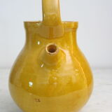 Enamelled terracotta jug