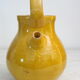 Enamelled terracotta jug