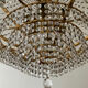 Chandelier cascade of tassels and brass
