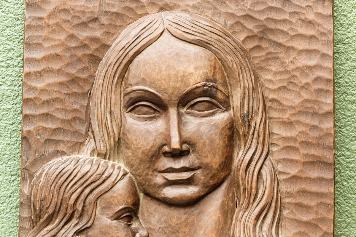 Modernist bas-relief, Virgin and Child, carved wood, signed