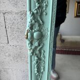 Large antique mercury mirror, patinated blue sculpted frame.