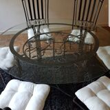 Elegant round table with 6 bronze and wrought iron chairs