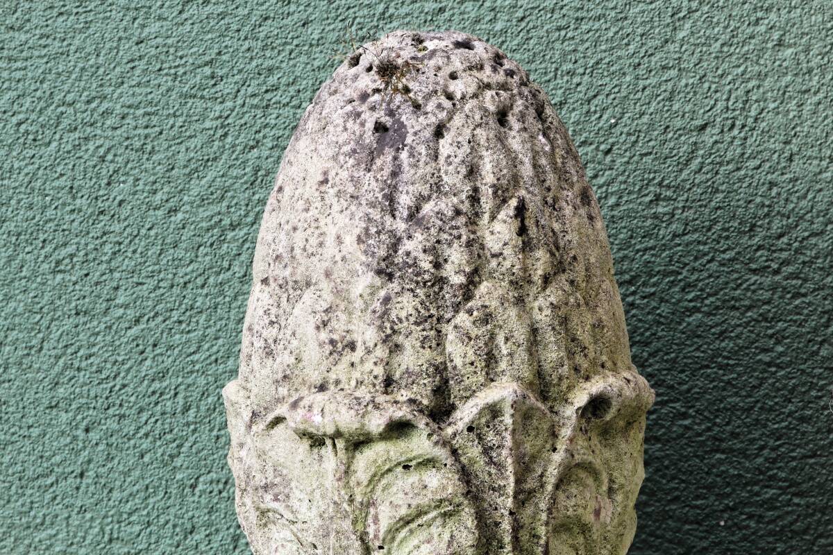 Pair of pine cones in reconstituted stone