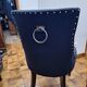 fauteuil capitonné velours noir design