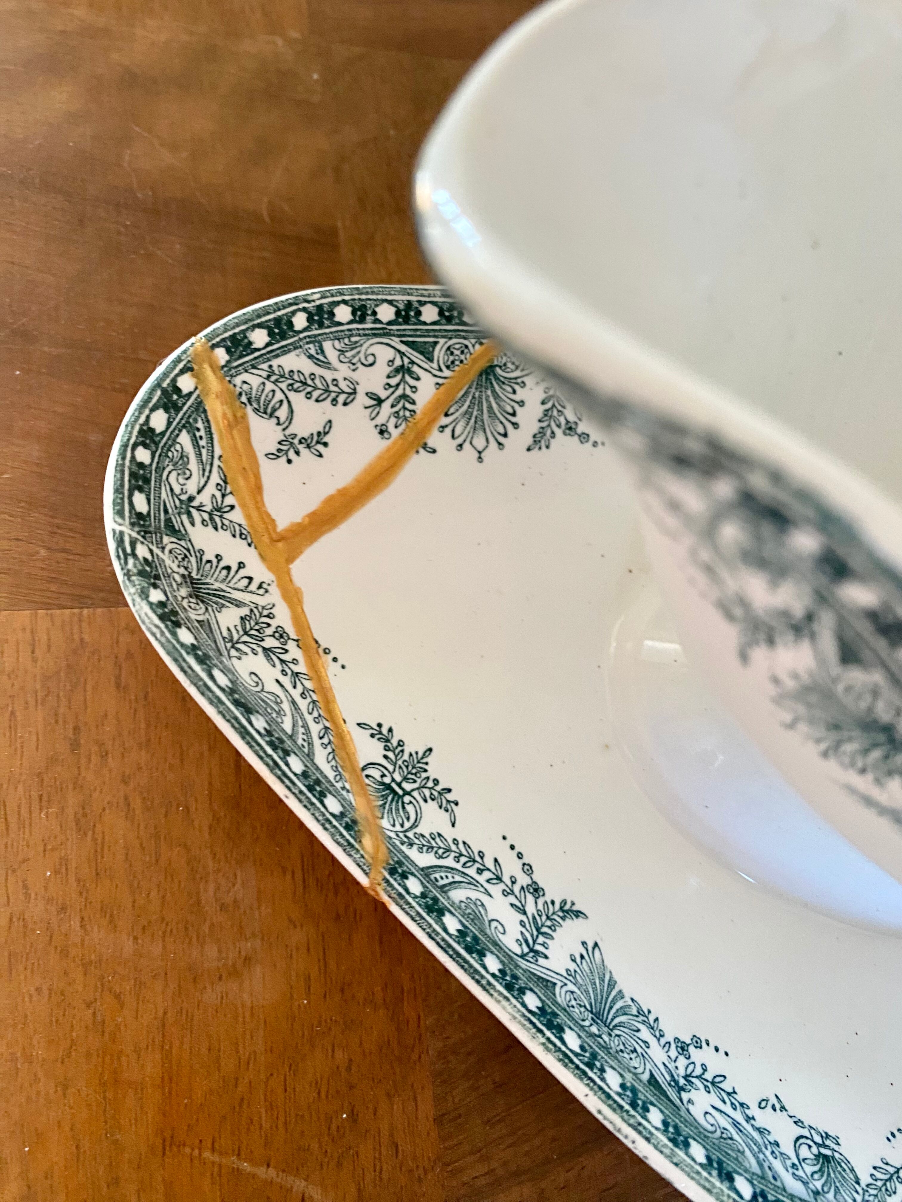 Old gravy boat repaired with the Japanese kintsugi technique