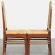 Set of four rattan Art Deco design dining chairs with high back