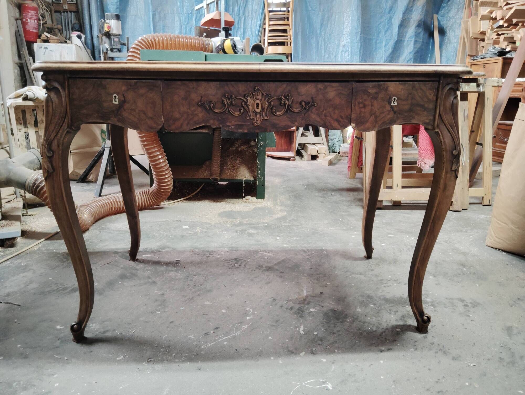 Louis XV desk with walnut burl.