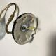 Pair of old swan neck wall lights in brass and transparent glass globe