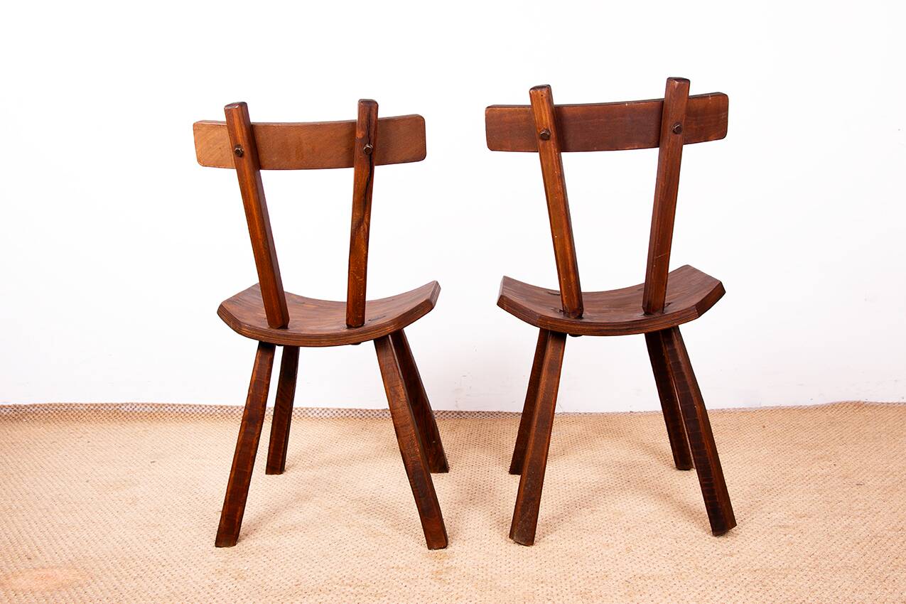 Brutalist pair of chairs in Elm in the style of Jean Touret 1950.