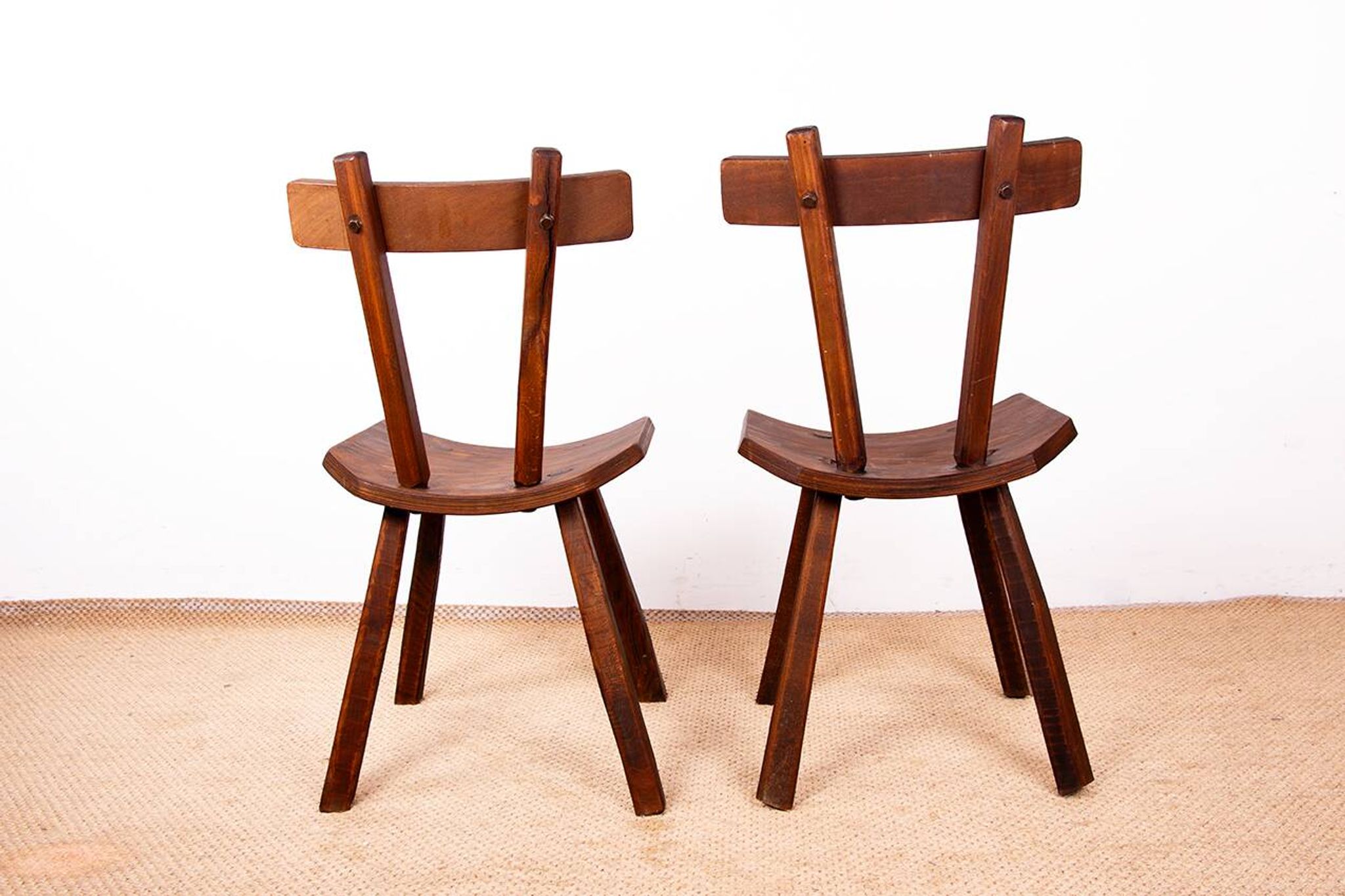 Brutalist pair of chairs in Elm in the style of Jean Touret 1950.