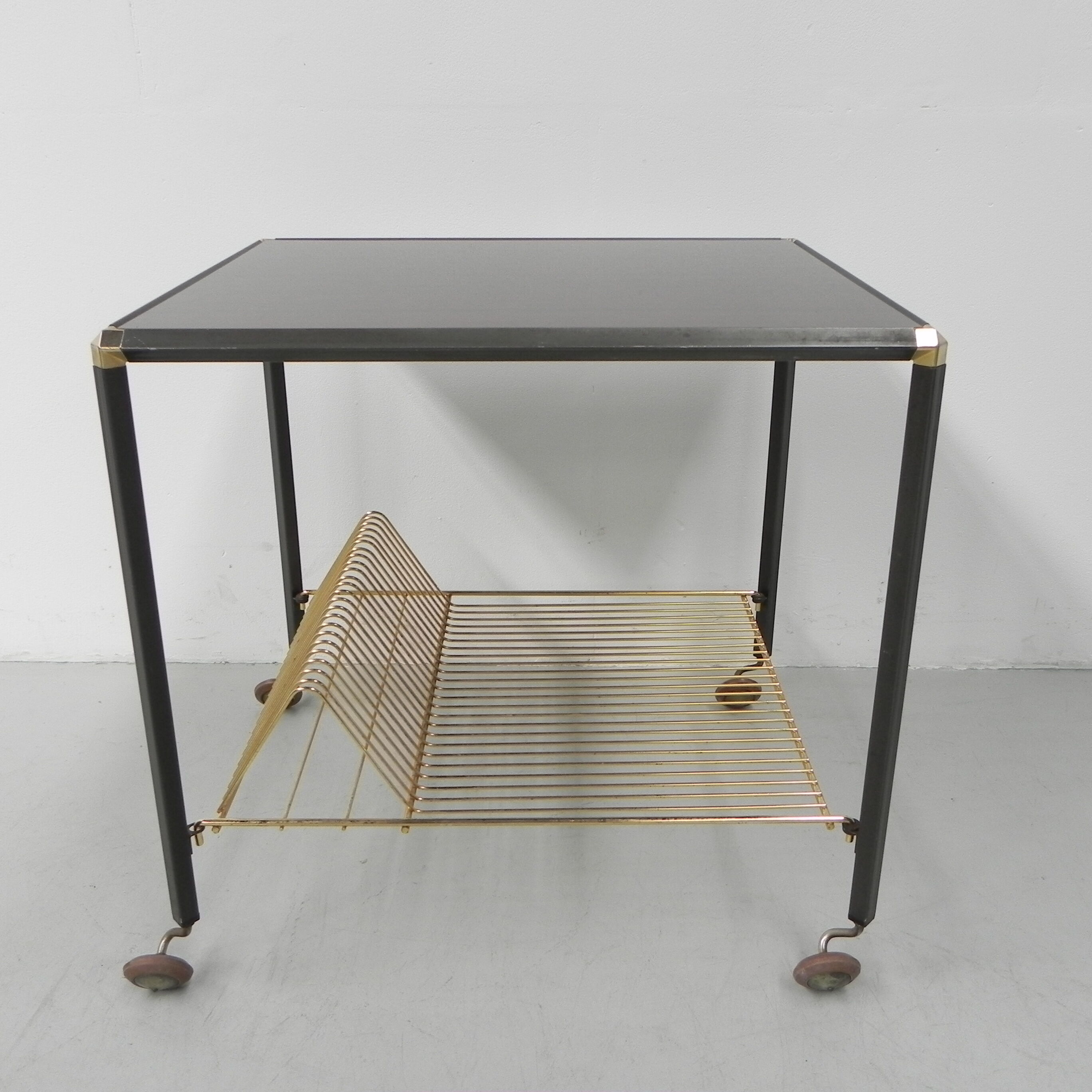 Vintage coffee table on castors with singles rack