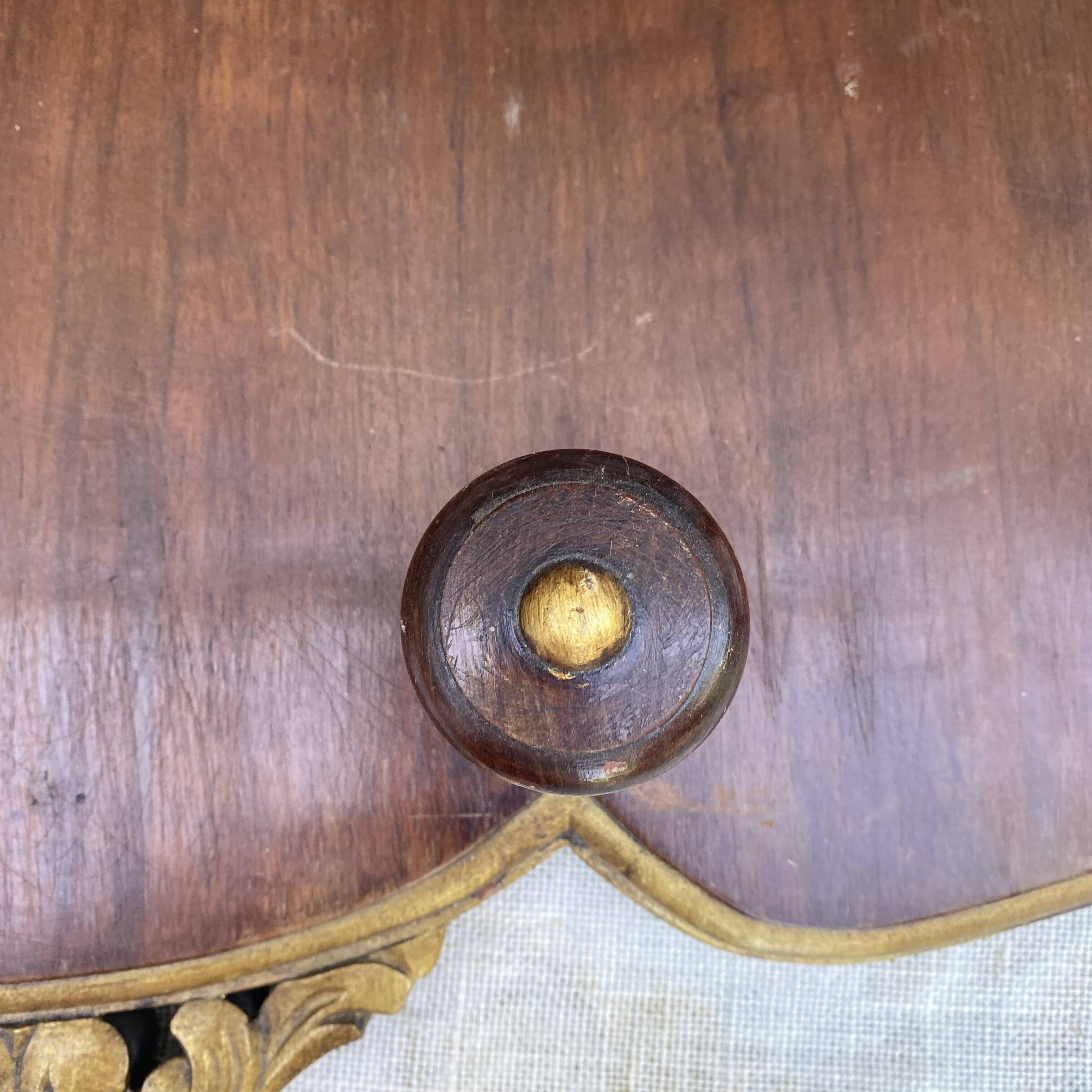 Coat rack and wall-mounted hat rack in an antique style.