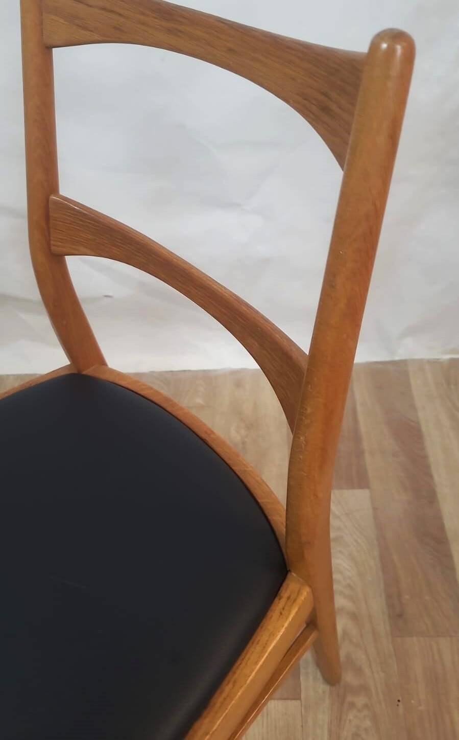 Vintage Danish teak chair – black faux leather seat (1960s)