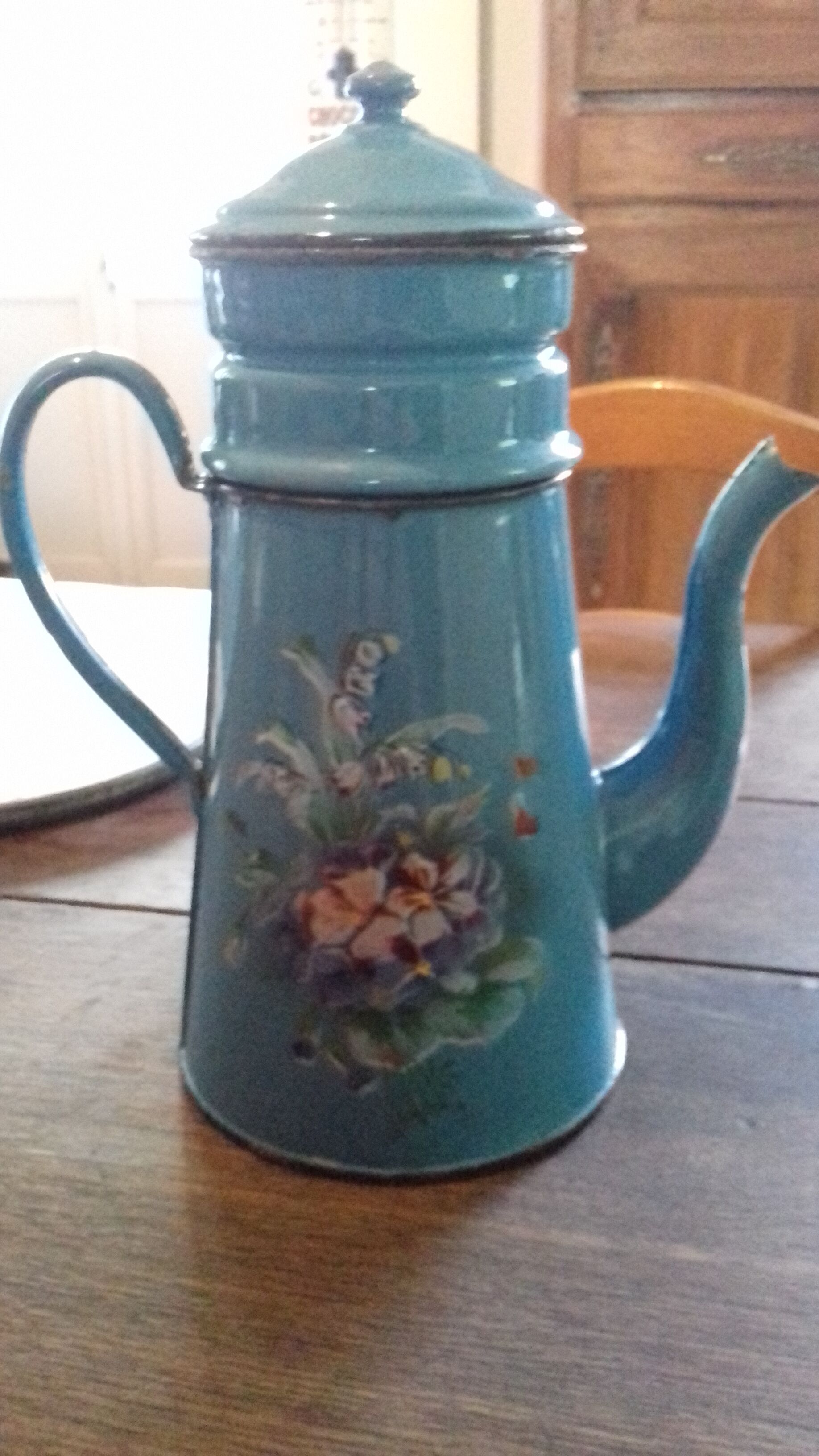 Blue enamelled coffee maker floral pattern