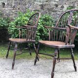 A pair of Windsor chairs in solid elm from the 1950s.