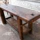 Workbench in raw wood with the press