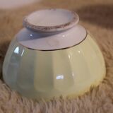 Antique earthenware bowl, pastel yellow
