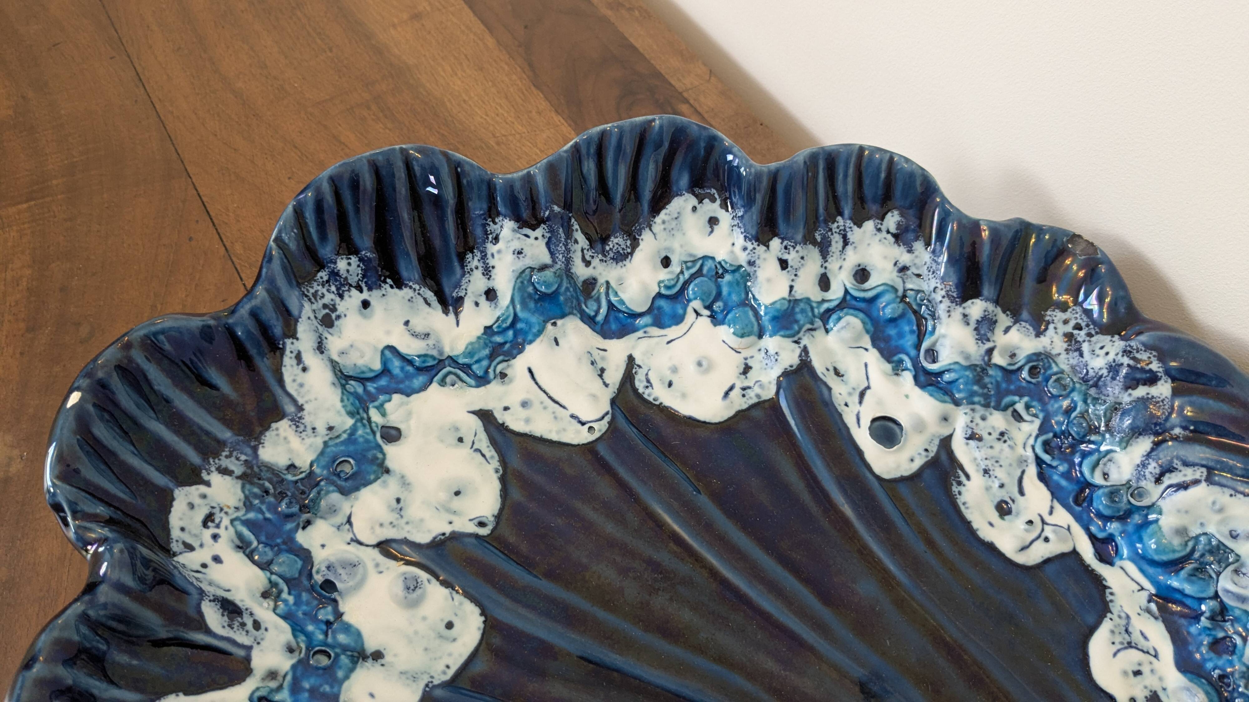 Large vintage shell-shaped blue glazed ceramic bowl