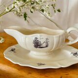 Antique sauce boat in Sarreguemines earthenware.