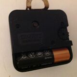 Brown formica clock by Japy 60s-70s