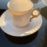 White cups with golden handle
