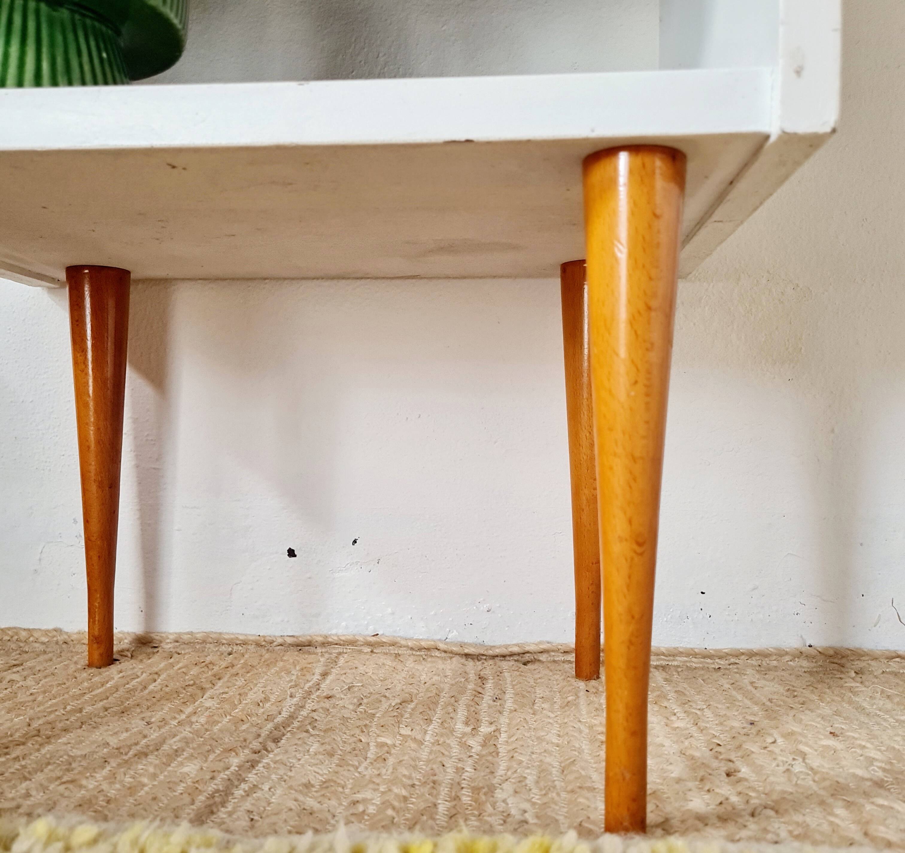 Vintage bedside table with tapered legs - white