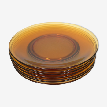 Set of 7 flat plates in amber glass Vereco France