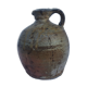 Ancient jug in glazed sandstone