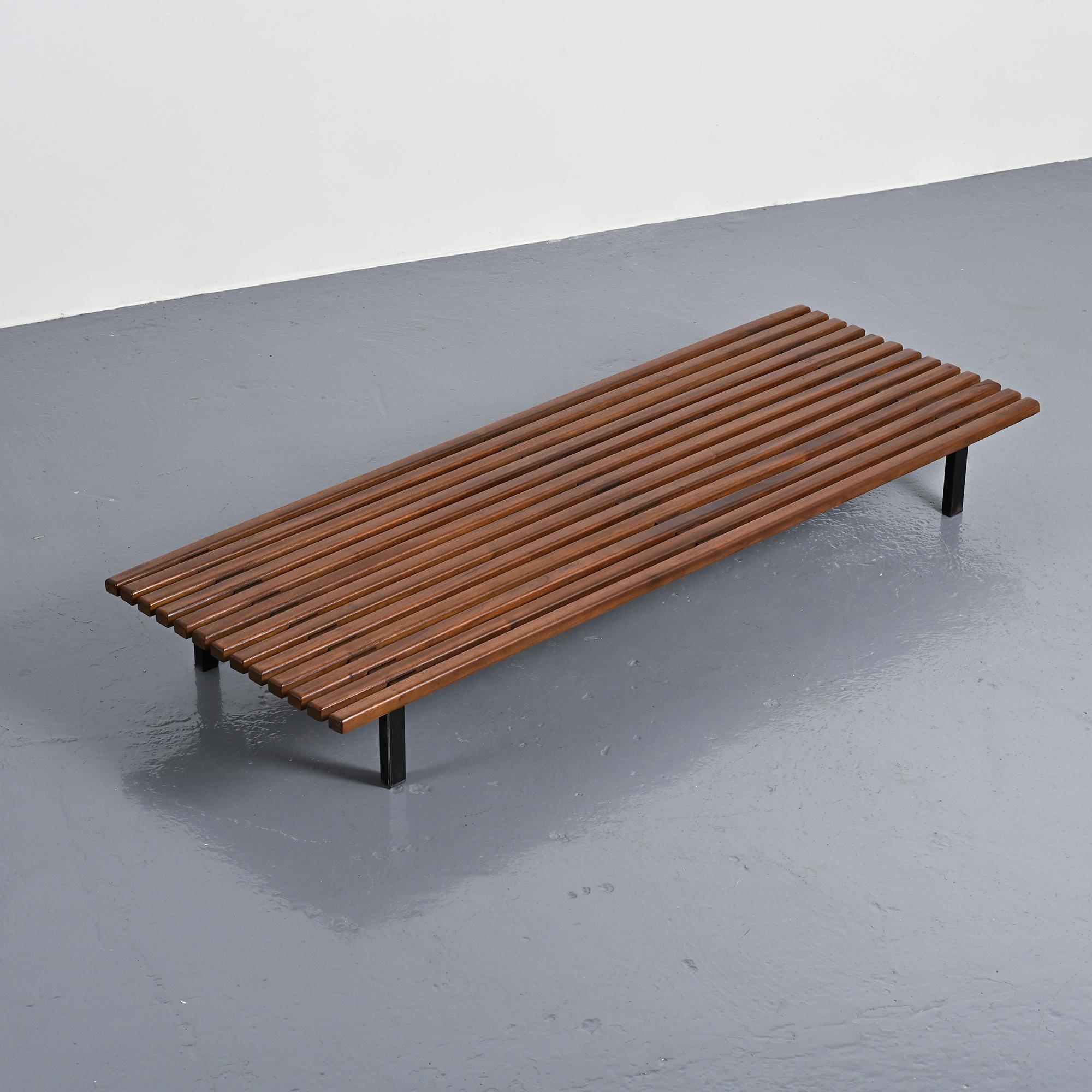 Cansado bench in mahogany by Charlotte Perriand, circa 1962.