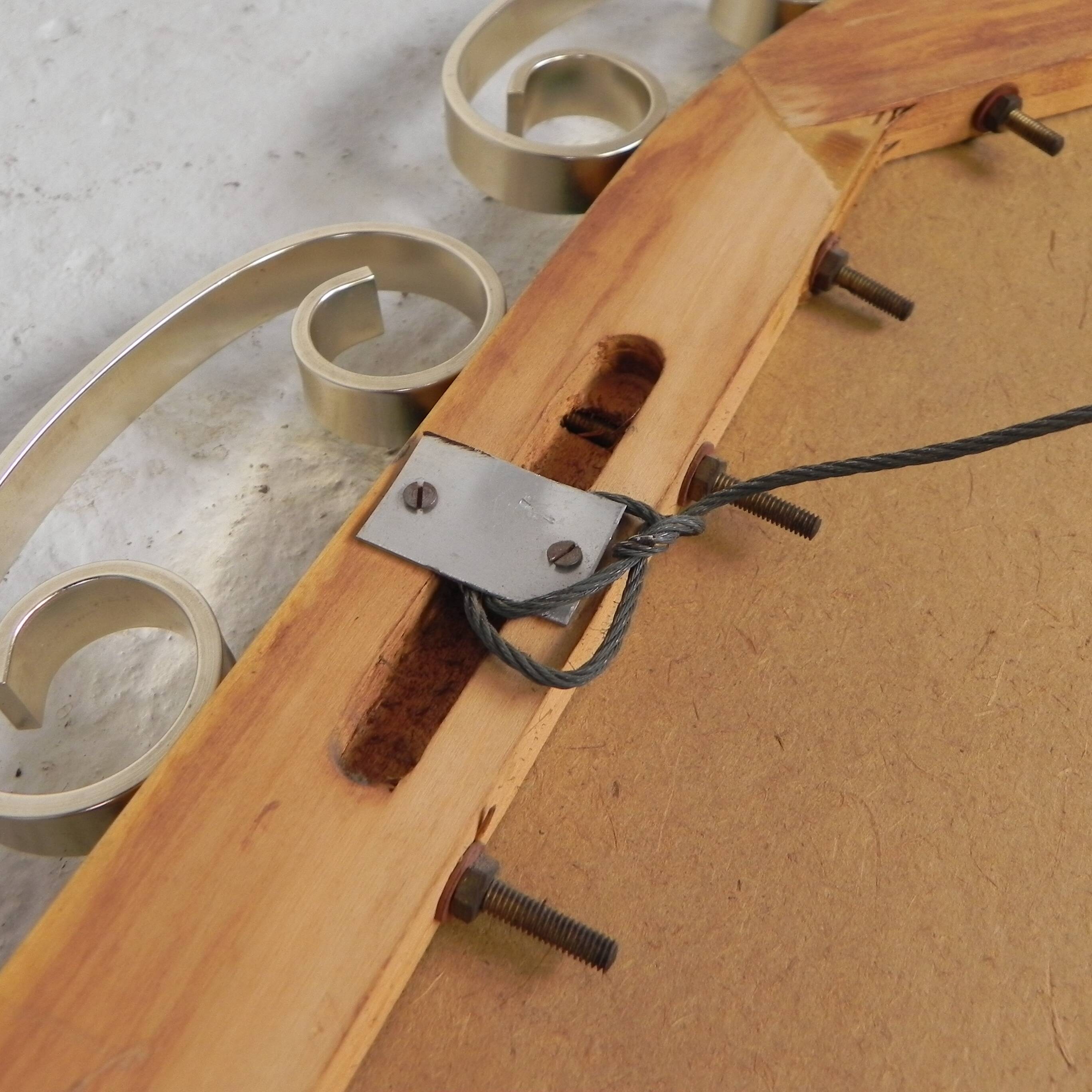 Vintage faceted mirror in an aluminium frame from the 1950s.