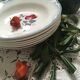 Six soup plates don't match in red and blue