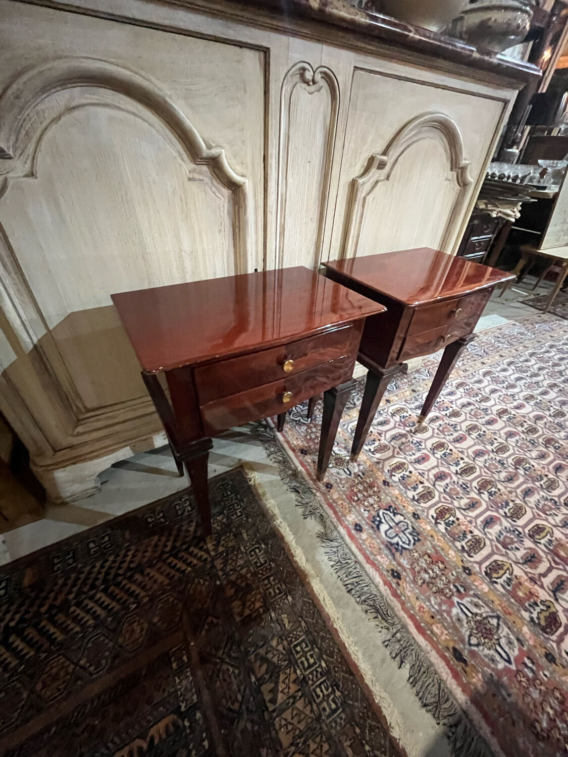 Pair of varnished mahogany bedside tables