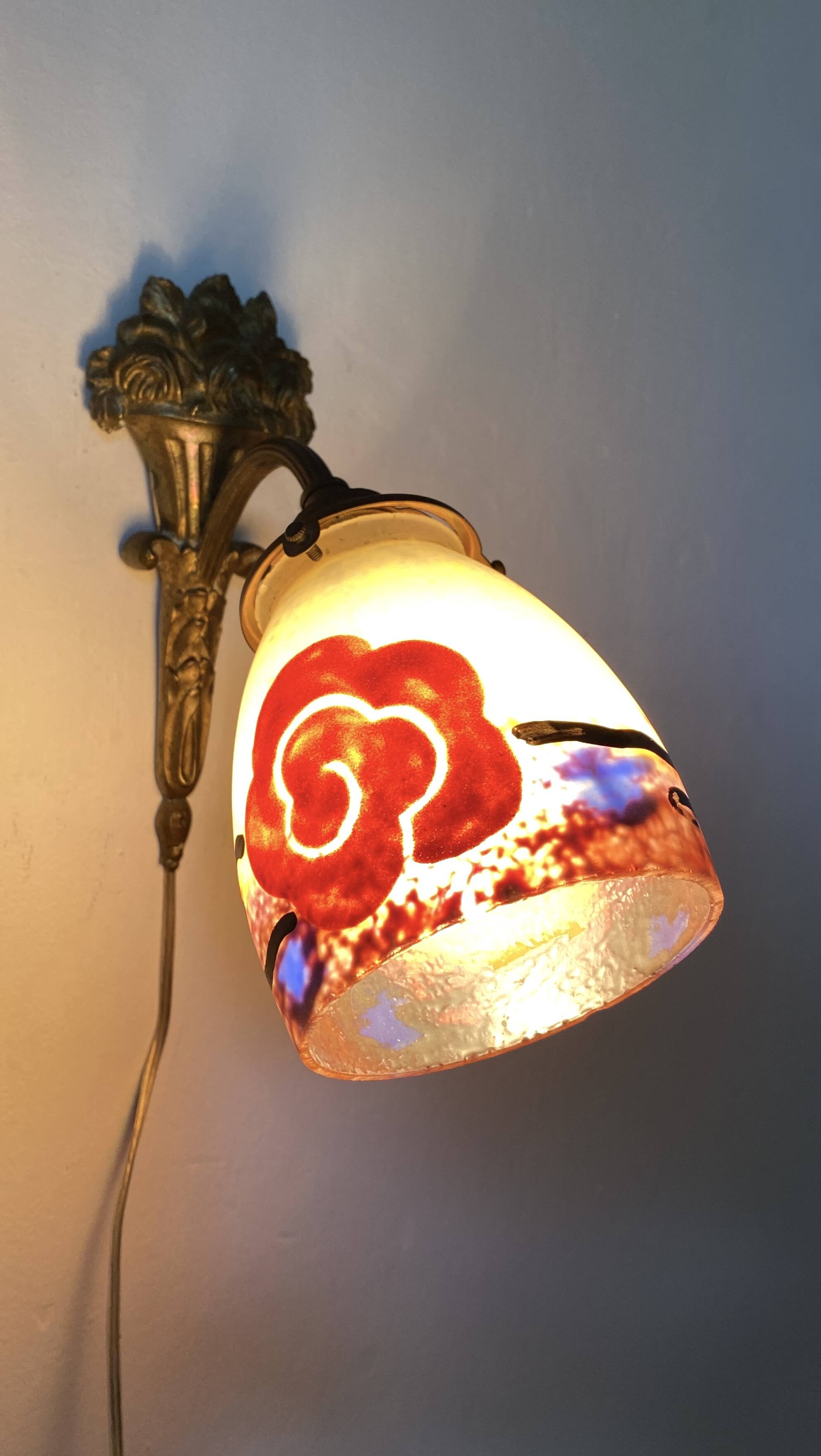 Antique bronze and glass paste wall light