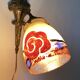 Antique bronze and glass paste wall light