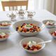 Vintage porcelain service: salad bowl and 8 small bowls.