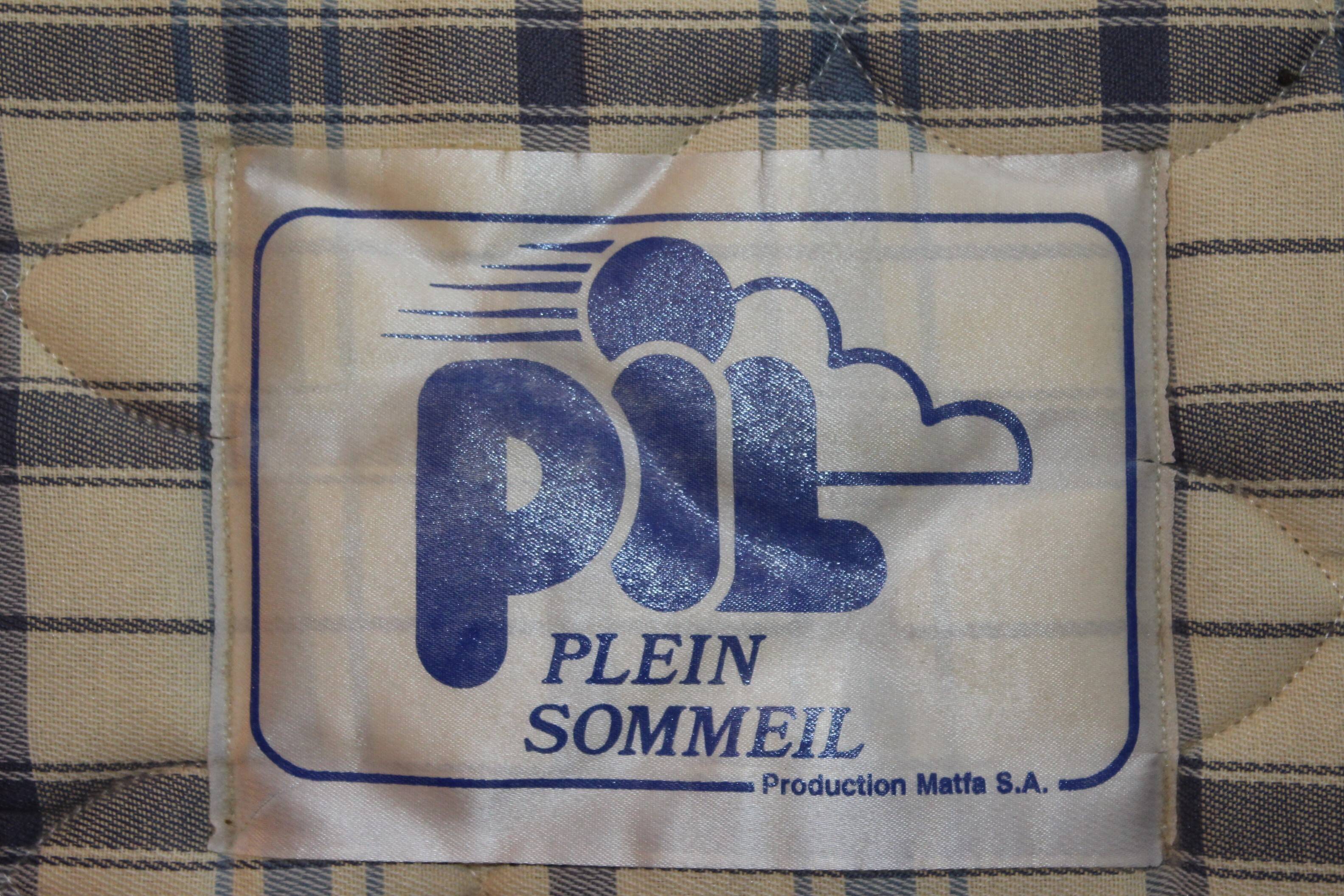 Walnut rocaille bed from the early 20th century.