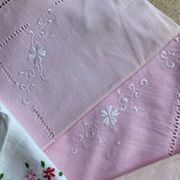 Set of embroidered baby bed sheets