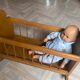 Vintage wooden rocking bed