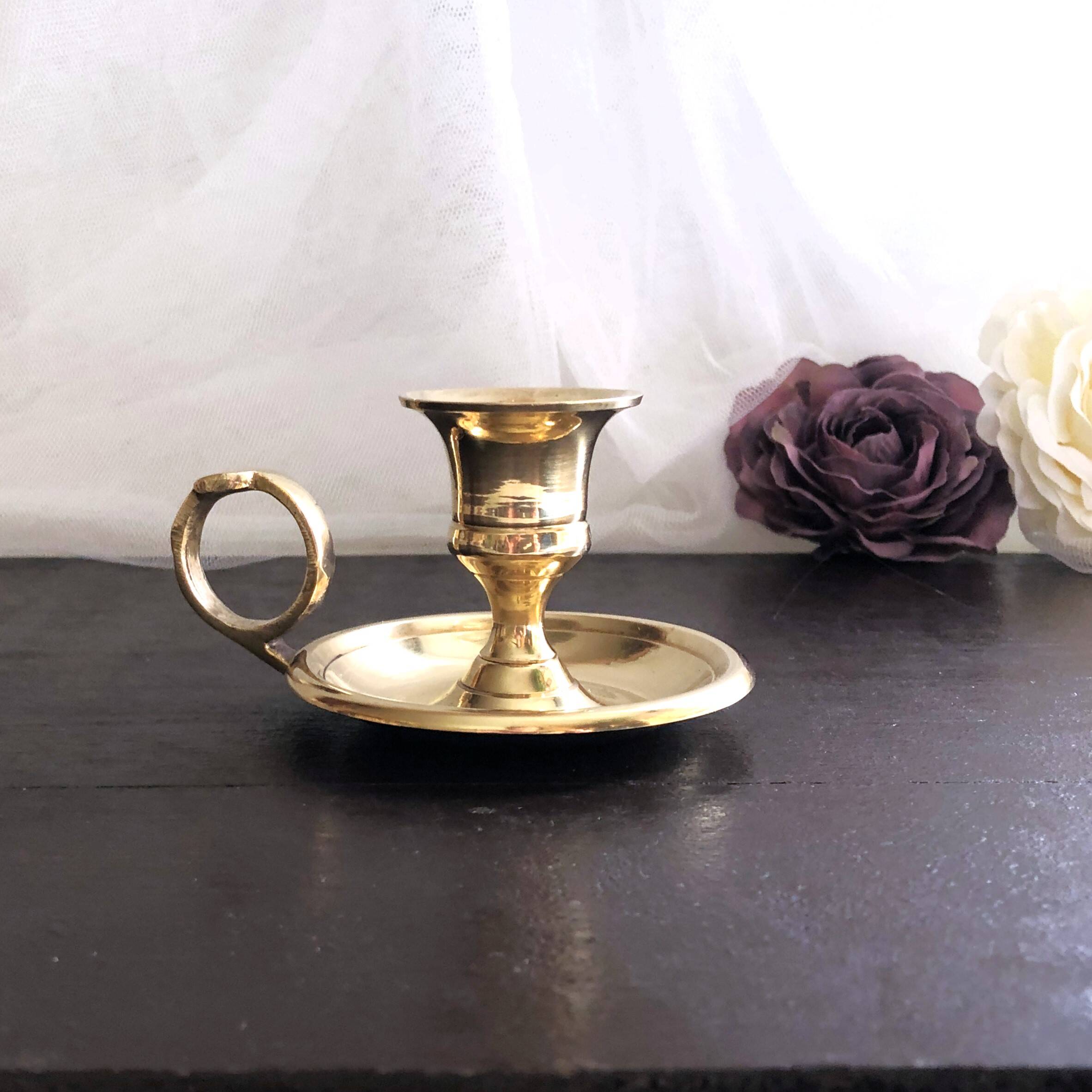 Hand candle holder called "Cave Rat" vintage golden brass