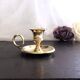 Hand candle holder called "Cave Rat" vintage golden brass