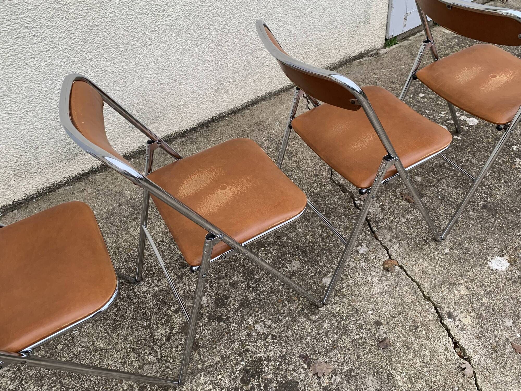 4 folding chairs chromed metal and Skaï fawn 1970