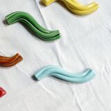 Set of 9 enamelled ceramic knife holders