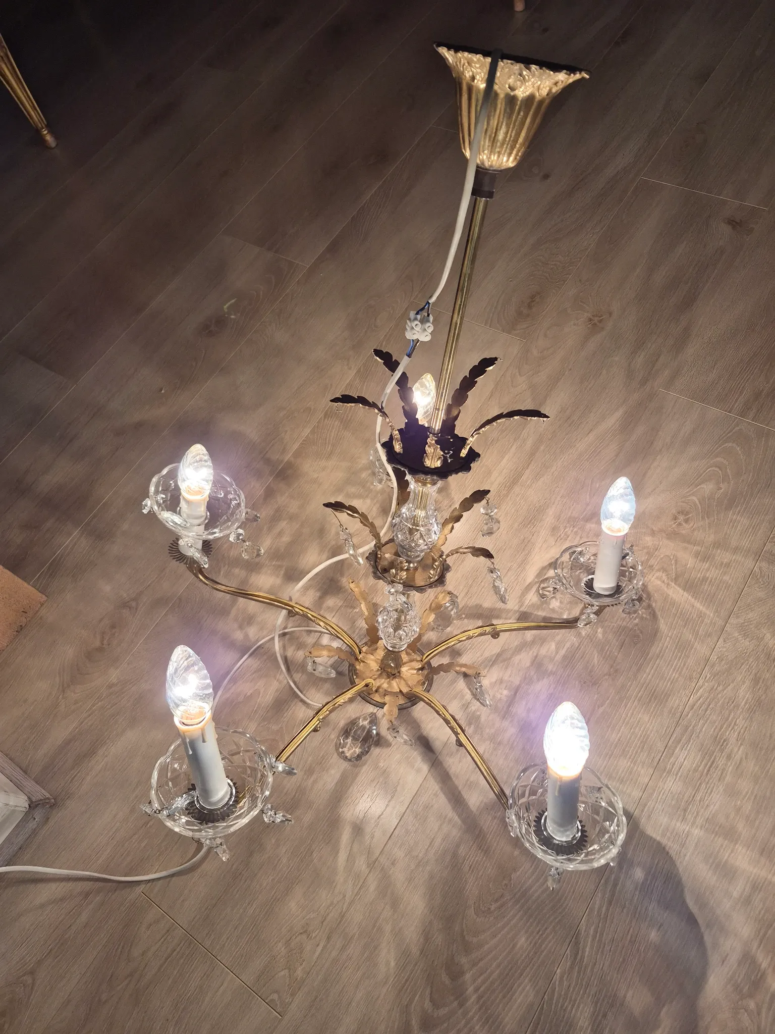 Antique chandelier with pendants, in bronze and glass pendants.