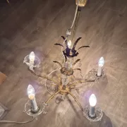 Antique chandelier with pendants, in bronze and glass pendants.