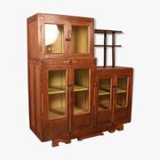 Antique Art Deco display cabinet in Burmese teak with original yellow patina interior.