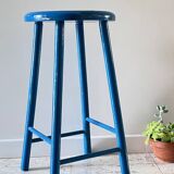 Vintage wooden stool with electric blue paint