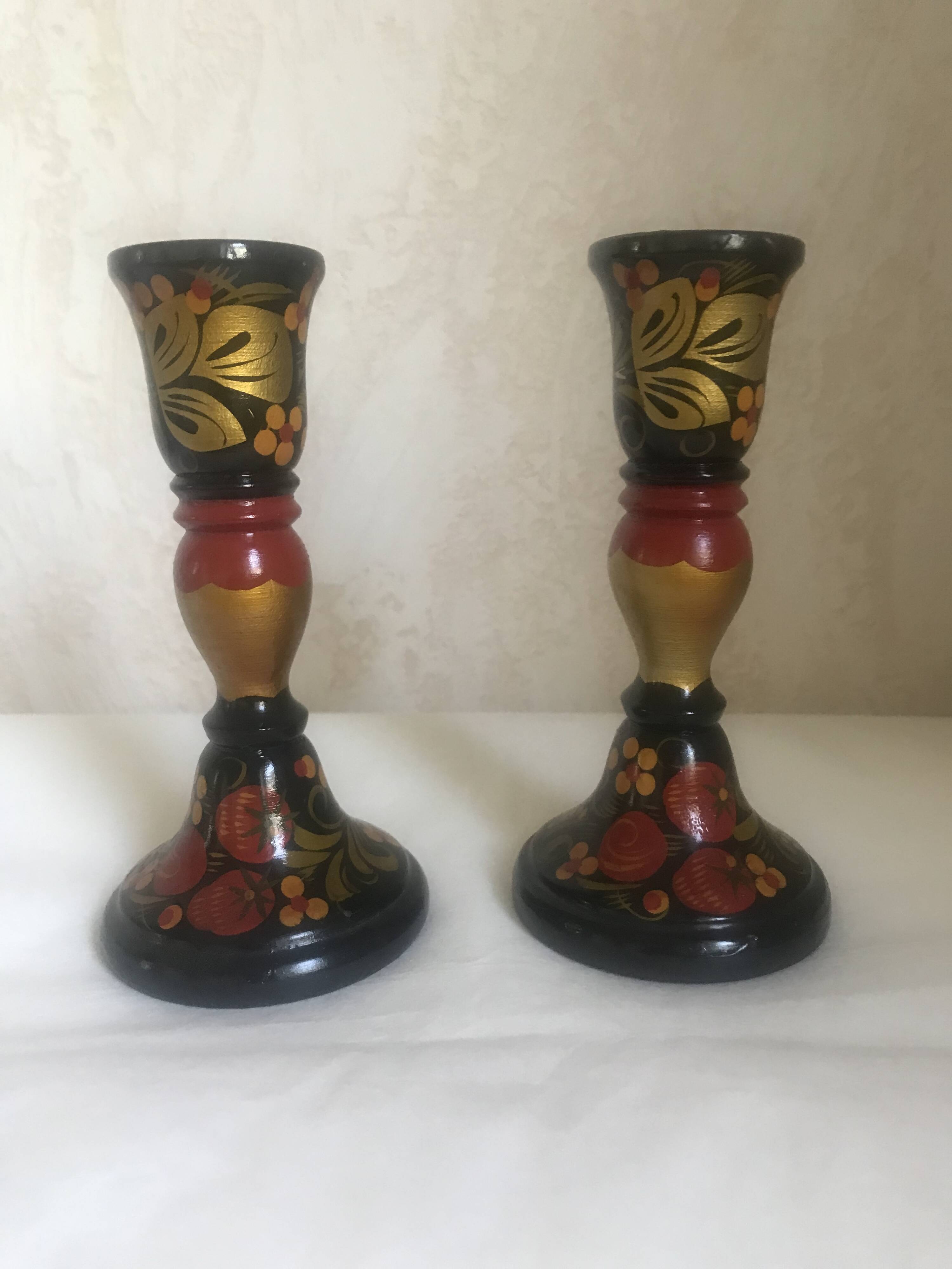 Varnished wooden candle holders