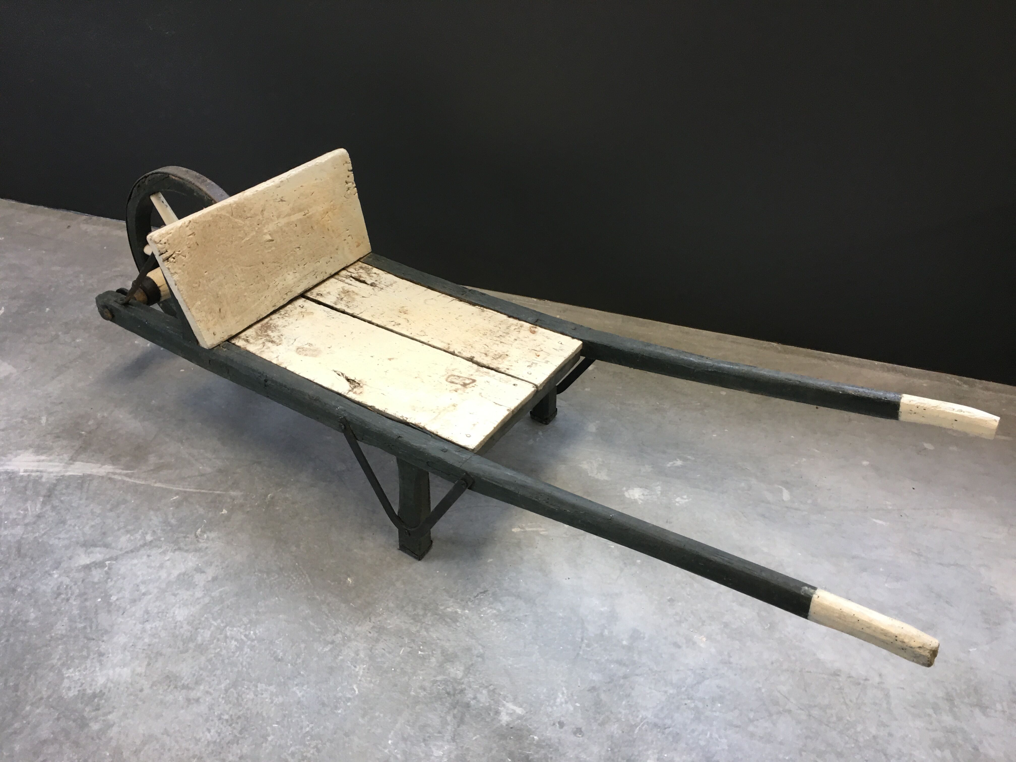 Painted wooden wheelbarrow