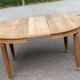 Large stripped solid oak dining table in Louis XVI style with 3 extensions.