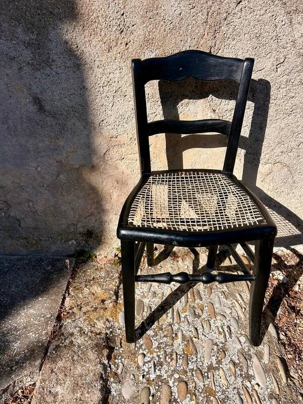 Small black antique chair